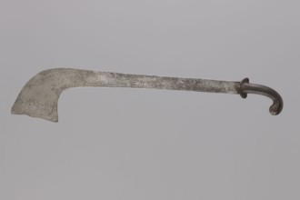 Sabre of the bark type, With a curved hilt and similar expanded engraving. Decorated with