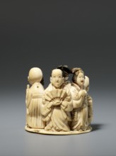 Okimono in the shape of a group of six singing people; material: sculpture; style/culture: