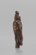 Netsuke in the shape of Fukurokuju riding a deer. The deer has all its legs put together so that