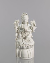 Guanyin on a lotus throne, Chinese, Blanc de Chine porcelain, 18th century, Fujian, China;