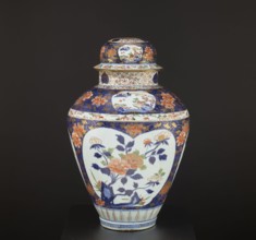 Vase tsubo with cover, Japanese, Imari ware, Edo period 1603–1868, decorated with plum trees,