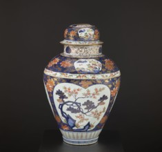 Vase tsubo with cover, Japanese, Imari style, Edo period 1603–1868, decorated with plum trees,
