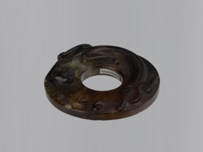 Disc with an image of a lizard;, Chinese, Qing dynasty, Qianlong period 1736–1795. Jade bi disc