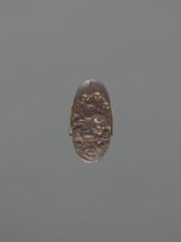 Sword hilt cap kashira, ; decorated with demons Oni and lightning; Japanese, Edo period 18th