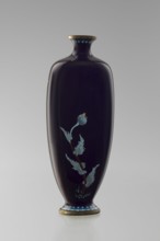 Angular vase one of a pair with rounded edges, on a low round foot and with a short neck slightly