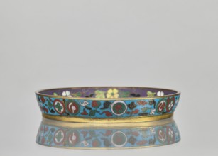 Plate. Cloisonné enamel huaniao, decorative vessel with a brim. Turquoise background with images of