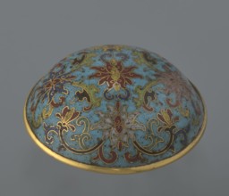 Cylindrical cloisonné enamel box with lid, spheroidal shape on a separate ring foot, slightly