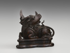 Mirror pedestal — lying unicorn on base; Chinese; qilin iconography; unicorns iconography; carved