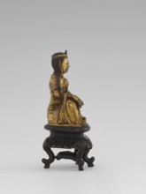 Bodhisattva Manjushri, on a base. Chinese, Qing dynasty 1644–1911, 18th century. Wooden sculpture;
