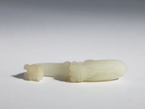 Belt clasp, Milky-white translucent jade. Chinese, Qing dynasty 1644–1911, 18th–19th century.