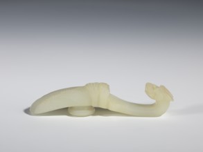 Belt clasp, Chinese, Qing dynasty 1644–1911, 18th–19th century. Milky-white translucent jade. Shaft