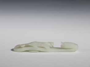 Belt clasp;, Chinese, Qing dynasty 1644–1911, 18th–19th century. Milky-white jadeite, slightly