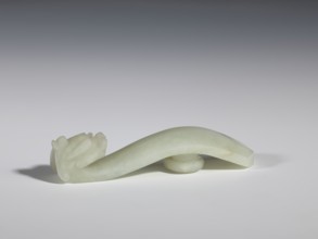 Belt clasp, stones; Chinese, Qing 1644–1911, 18th–19th century. Milky-white jade with colloid