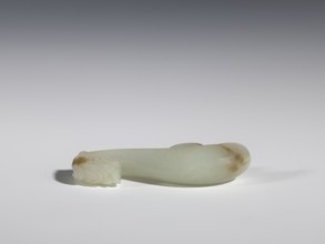 Belt clasp, Chinese, dragons iconography, Qing 1644–1911, milky-white jade with brown veins and