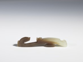 Belt clasp, Chinese, Qing 1644–1911, 17th–18th century. Gray-beige jadeite with chalcedony