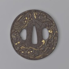 Crossguard tsuba, Masashige. Round tsuba maru gata with a slightly raised, irregularly outlined
