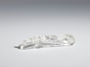Belt clasp, Chinese; Qing 1644–1911. Rock crystal with inclusions; full-plastic carved head; shank: