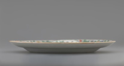 Plate. Porcelain fragment; white glaze. Decoration painted with overglaze enamel paints and iron