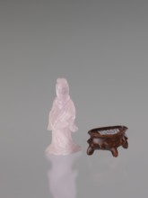 Guanyin on a base; figurine carved in rose quartz; full sculpture with engraving; Chinese; Qing
