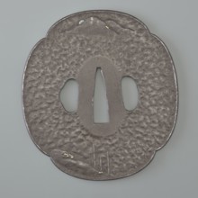 Crossguard tsuba, attributed to Kaneie craftsman/school. Tsuba in the shape of a quatrefoil mokkô