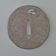 Crossguard tsuba, Kaneie,  school craftsman author. Oval tsuba with an irregular outline slightly
