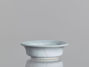 Flowerpot saucer, Chinese ceramics, Qing 1644–1911, 19th century. Grey-blue glaze with cracklework.
