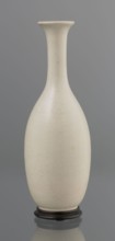 Vase on saucer. Vase made of stoneware or thick porcelain?, ovoid with a long cylindrical neck