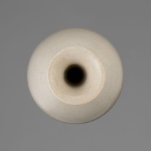 Vase on saucer. Vase made of stoneware or thick porcelain?, ovoid with a long cylindrical neck