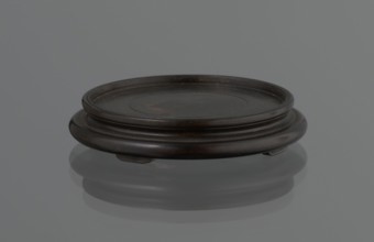 Vase on saucer. Vase made of stoneware or thick porcelain?, ovoid with a long cylindrical neck