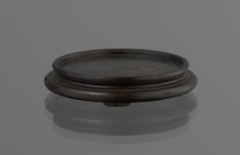 Vase on saucer. Vase made of stoneware or thick porcelain?, ovoid with a long cylindrical neck