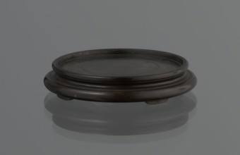 Vase on saucer. Vase made of stoneware or thick porcelain?, ovoid with a long cylindrical neck