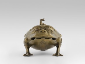 Incense burner with a cover — moon frog toad. Cast in bronze studded with copper. Popular motif in