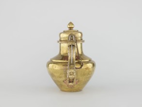 Teapot, Tibetan, 19th century. Jug with a lid on a chain; dragon-shaped handle, spout probably in
