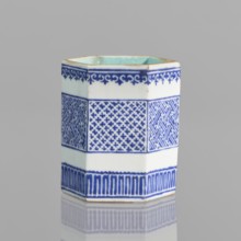 Hexagonal bowl holder in the shape of a prism, incense container. Porcelain body with white glaze