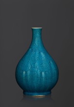 Vase in the shape of an onion-shaped bottle with a narrow, short neck. Onion-shaped bottle-vase