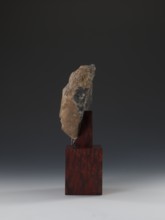 Head of Guanyin Bodhisattva, sculptor unknown. Polychrome-coated feldspar fragment of a statue with