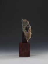 Head of Guanyin Bodhisattva, unknown sculptor; polychrome-coated feldspar fragment of a statue with
