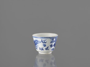 Bowl, Chinese, 19th century. Blue-and-white porcelain vessel decorated with dragons, phoenixes