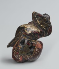 Netsuke in the shape of a sanbasô dancer;, Japanese, Edo period 18th century; netsuke figurine