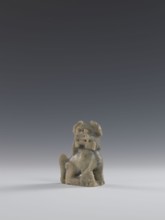 Seated lion, Chinese, lion fo iconography, Qing dynasty 1644–1911. Figurine carved in soapstone
