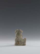 Seated lion, Chinese, lion fo iconography, Qing dynasty 1644–1911. Figurine carved in soapstone