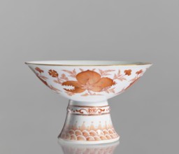 Platter, Chinese, ceramics; porcelain platter on a tall, widening foot. Decoration painted with red