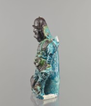 Warrior figurine, Chinese, ceramic figurine of a male warrior, green and brown glaze, 17th century,