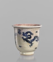 Bowl, Chinese, 19th century. Blue-and-white porcelain bowl with rolled edge and small foot.
