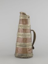 Tea pot;, 19th century, Tibet. Tea vessel/jug tapering towards the top with silver fittings and