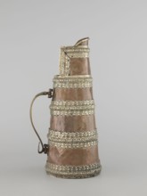 Teapot, maker, 19th century, Tibet. Teapot jug tapering towards the top with silver fittings and a