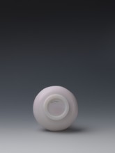 Vase, unknown creator; glass flask of pale pink glass on a low ring foot with a straight long