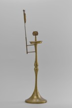 Candlestick, Early 20th century, Korea. Candlestick on a round base transitioning into a