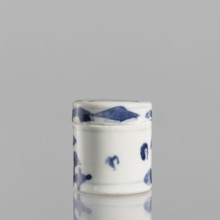 Cylindrical jar with a lid; ceramics; blue-and-white porcelain; cylindrical vessel with attached