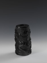 Vase, Chinese, Qing dynasty 1644–1911, 19th century. Bas-relief decoration with dragons iconography